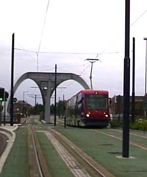 Midlands Metro AnsaldoBreda T-69 tram under bridge